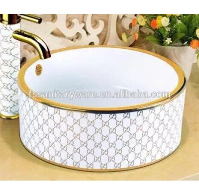 artistic above counter round ceramic basin, gold color ceramic wash basin,hot sell wash basin